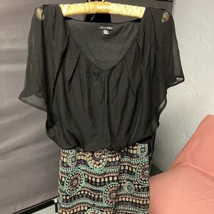 Beautiful new black with blue/green dress. Size small.